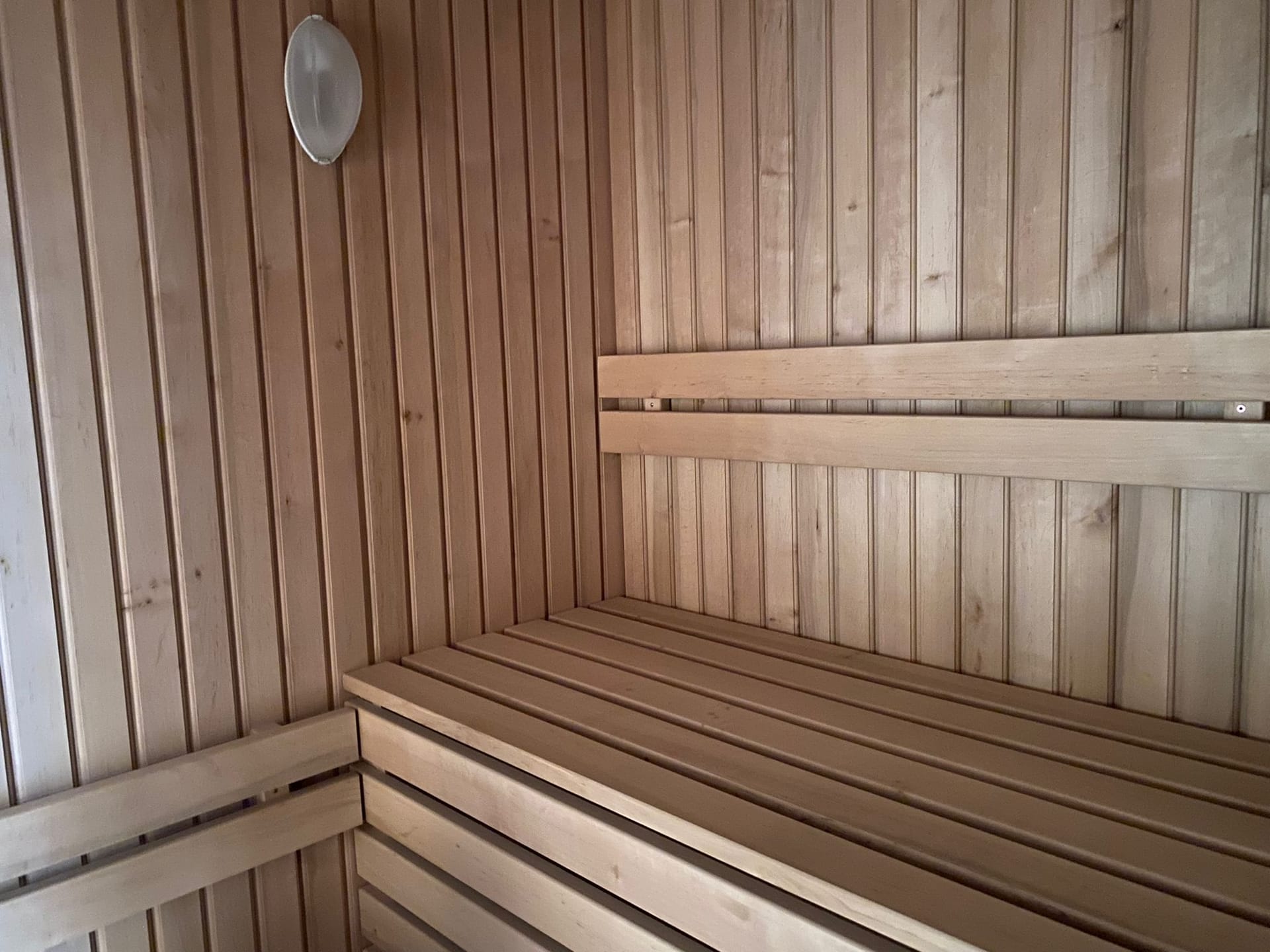 The finished interior: benches, panelling and light fitting