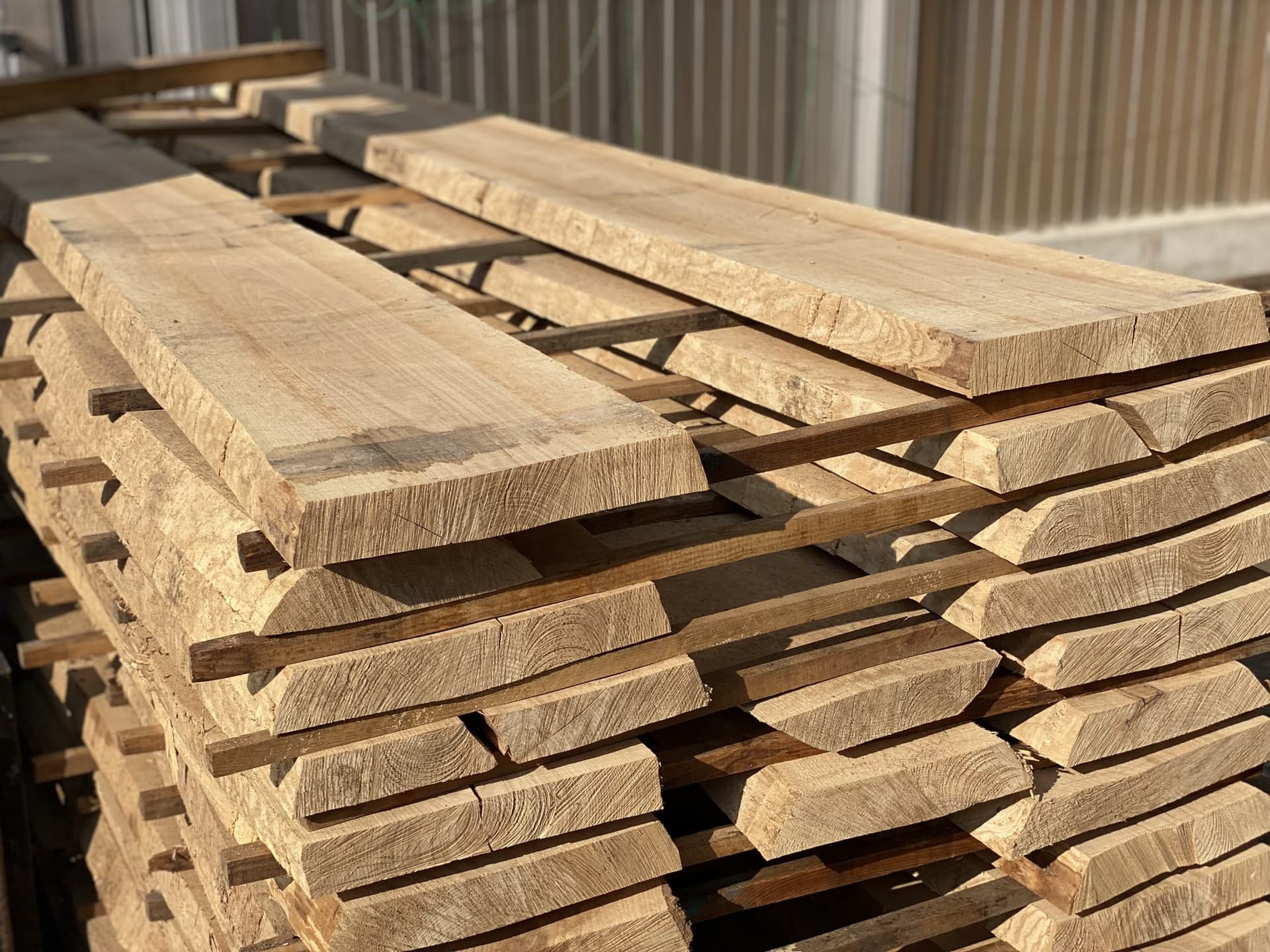Unedged boards on stickers, a pack with the natural edge visible